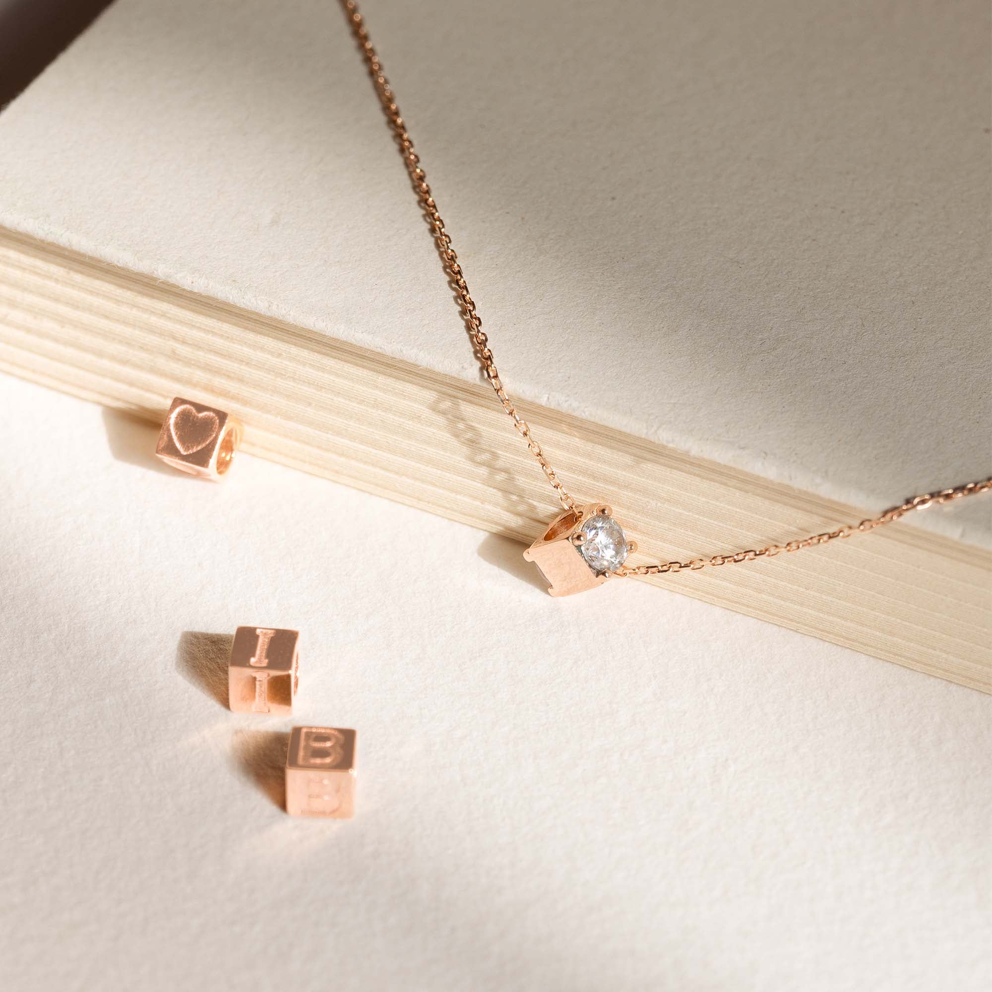 Isabel Bernard La Concorde Felie 14 Carat Rosegold cube Initial Charm IB350047-Z